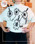 Pull noir et blanc motif reflet