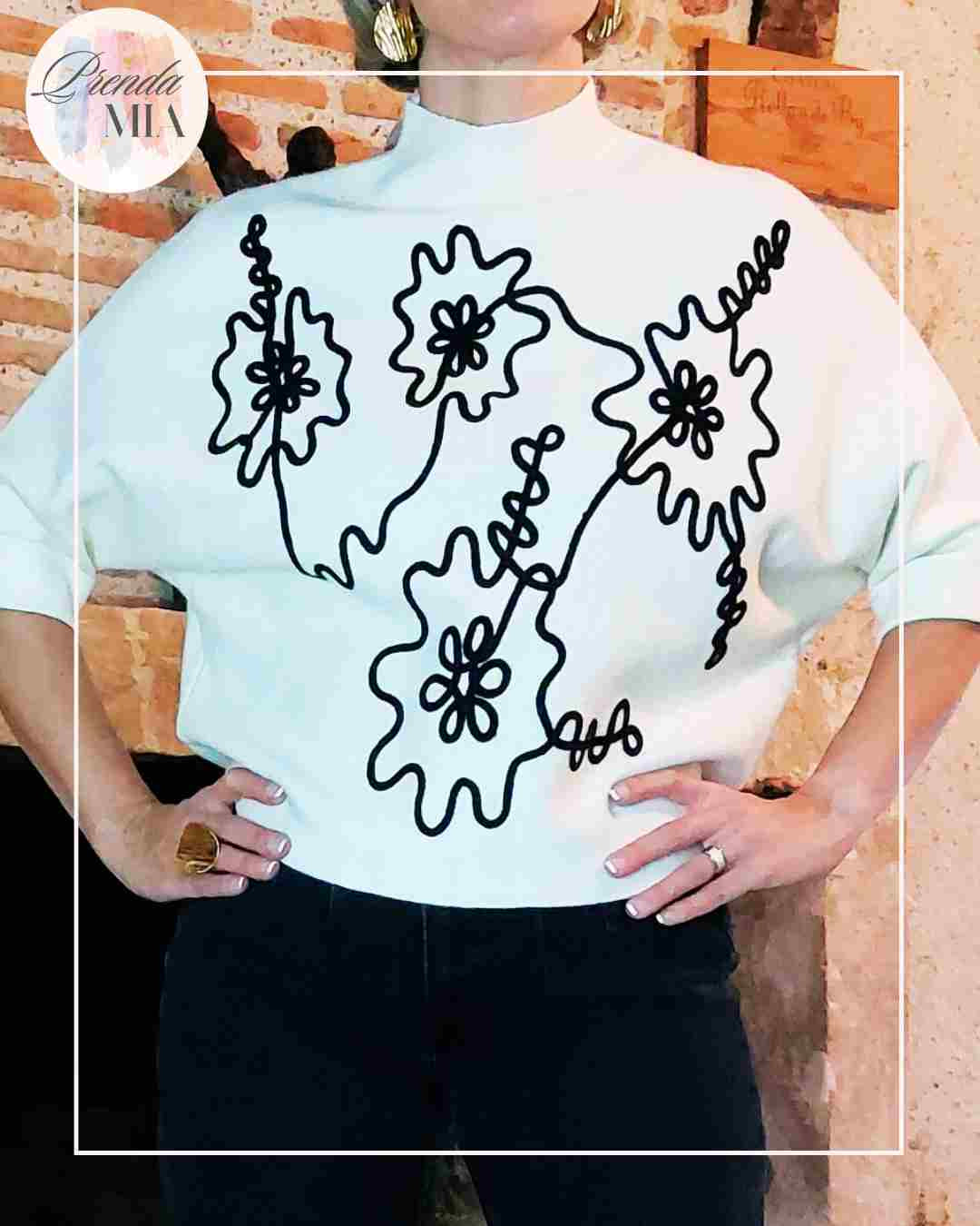 Pull noir et blanc motif reflet