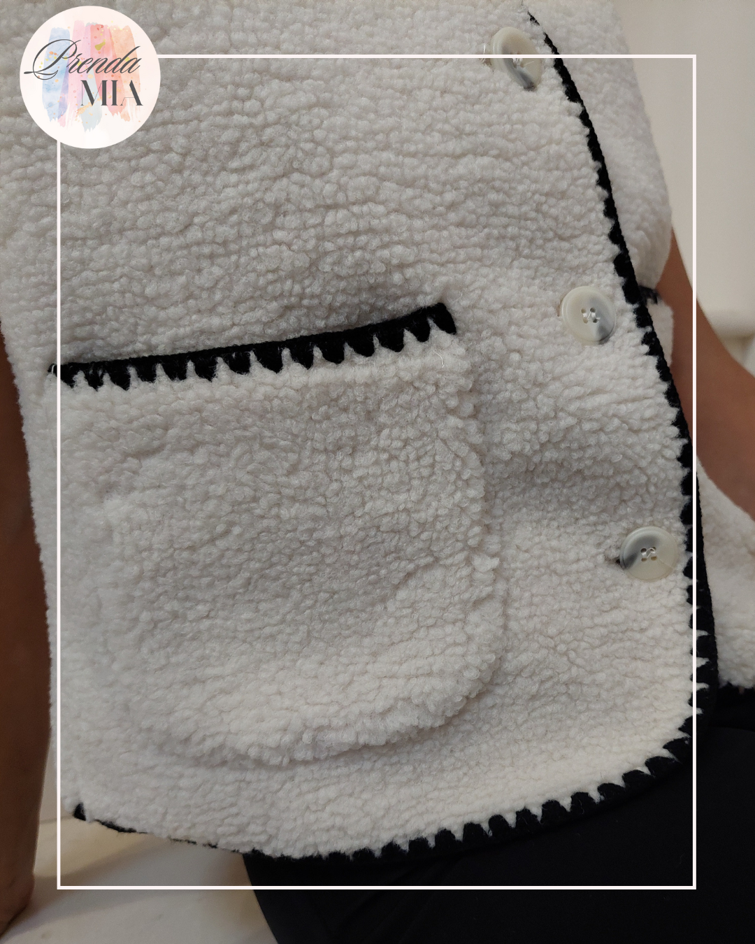 Gilet sans manches liseré noir