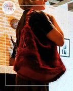 Burgundy fur handbag