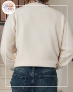 Gilet beige à liseré fleuri