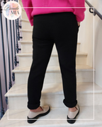 Black velvet-effect trousers