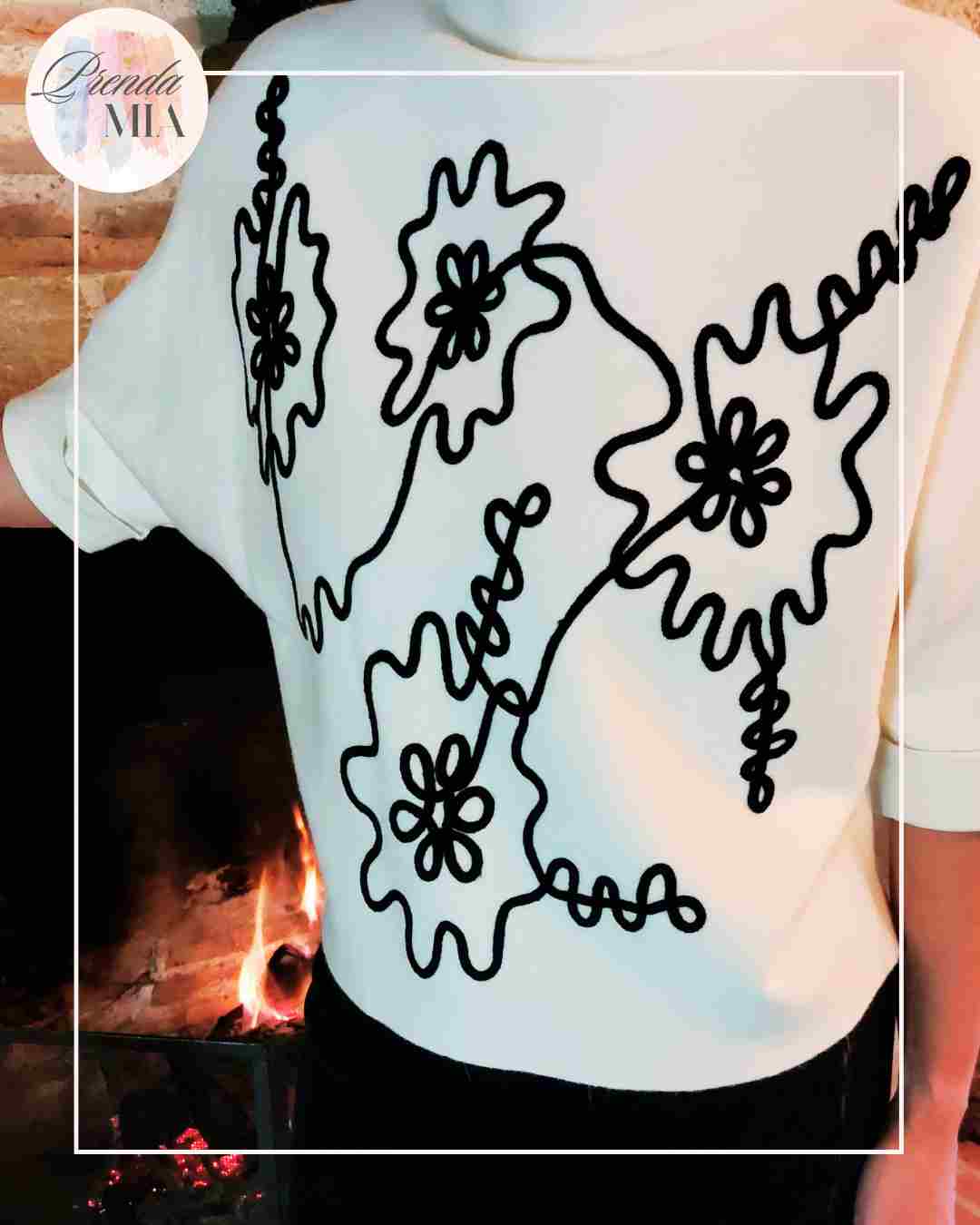 Pull noir et blanc motif reflet