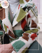 Veste courte en laine à motifs